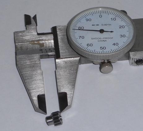 gear being measured by calipers